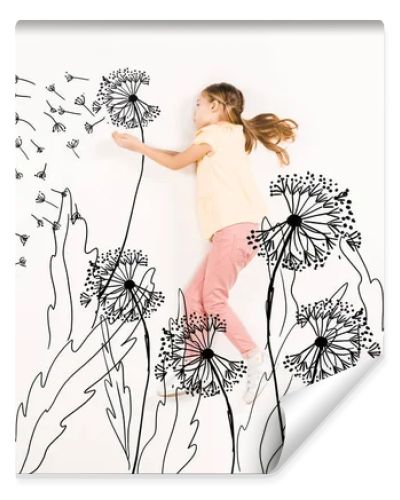 top view of kid blowing dandelion seeds while flying on white 