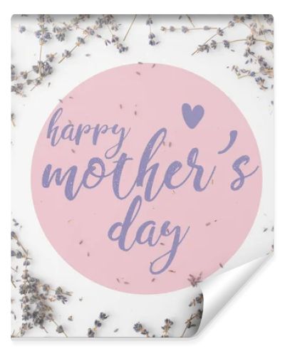 top view of mothers day greeting with frame of lavender flowers on white tabletop