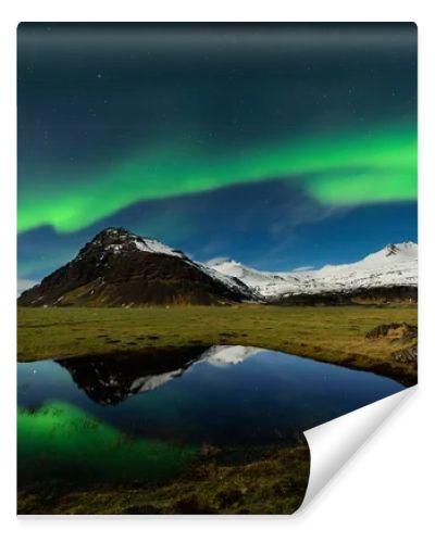 Spectacular aurora borealis near the glacier lagoon Jokulsarlon in Iceland.