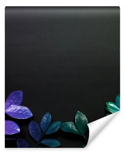 Creative fluorescent color layout made of tropical leaves with neon light square. Flat lay. Nature concept