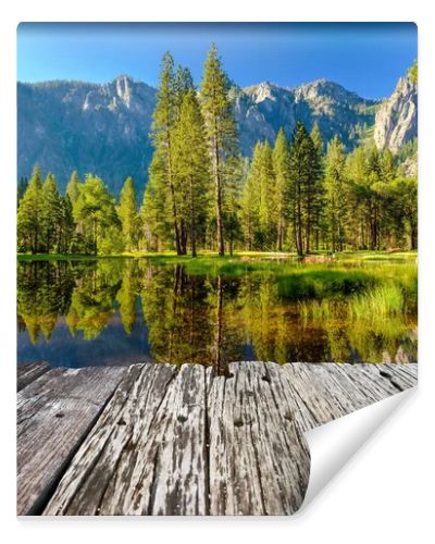 Cathedral Rocks reflecting in Merced River at Yosemite National Park. California, USA.