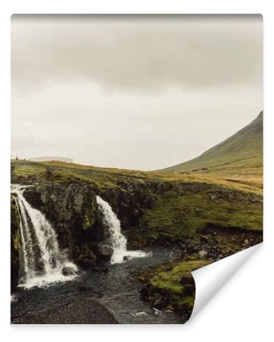 amazing landscape with majestic scenic waterfall in Iceland 