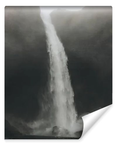 bottom view of Haifoss waterfall with mist around, Iceland