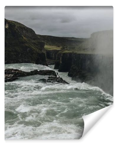 scenic view of steam above beautiful Gullfoss waterfall in Iceland