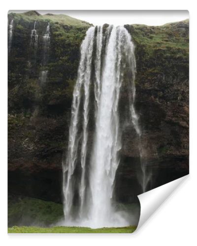 scenic view of beautiful Seljalandsfoss waterfall in highlands in Iceland 