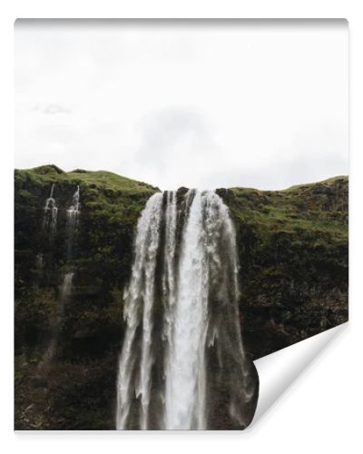 low angle view of Seljalandsfoss waterfall in highlands in Iceland 