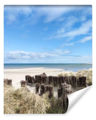 Baltic sea dunes over blue coastline background in Northern Germany