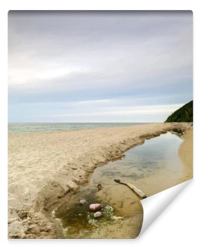 Natural landscape from the sea on a cloudy windy day.
