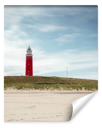 Lighthouse at Texel Netherlands in seashore landscape