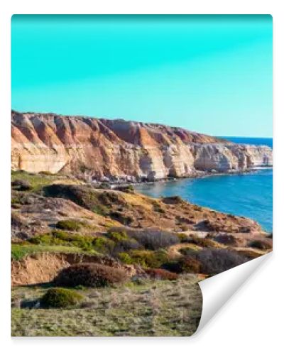 Maslin Beach, located 42 km south of Adelaide on South Australias Fleurieu Peninsula, is renowned for its pristine white sands, clear turquoise waters, and dramatic ochre cliffs. As Australias first legal clothing-optional beach, established in