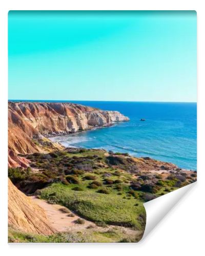 Maslin Beach, located 42 km south of Adelaide on South Australias Fleurieu Peninsula, is renowned for its pristine white sands, clear turquoise waters, and dramatic ochre cliffs. As Australias first legal clothing-optional beach, established in
