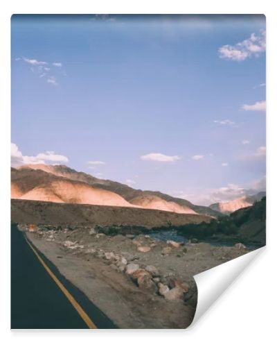 asphalt road and majestic rocky mountains in Indian Himalayas, Ladakh region