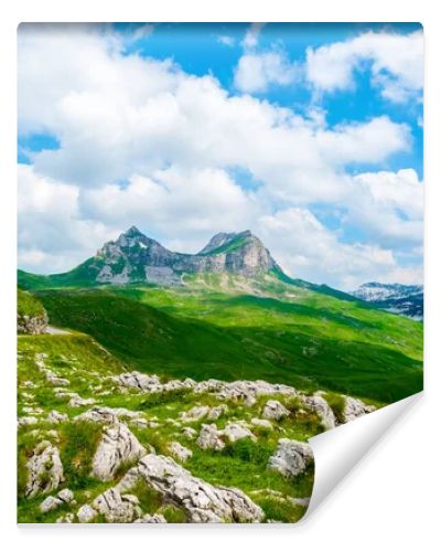 rocky mountains and blue cloudy sky in Durmitor massif, Montenegro