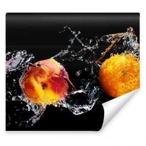 Set of fresh fruits in water splash isolated on black background