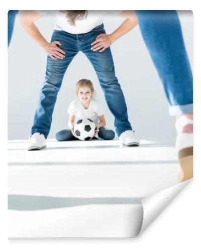 family with soccer ball