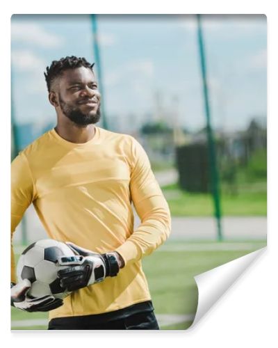 african american goalkeeper with ball