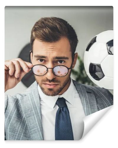 businessman with soccer ball