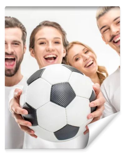 Cheerful friends with soccer ball