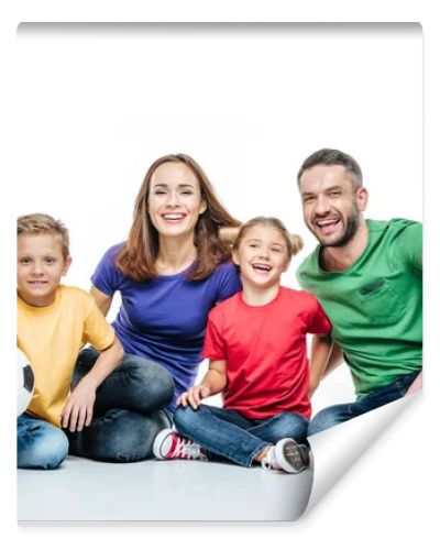 Happy family with soccer ball