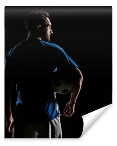 silhouette of muscular sportsman holding ball isolated on black