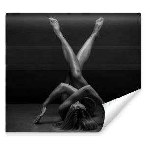 Sportowe Nagie ciało kobiety na czarnym tle Zdjęcie artystyczne kobiecego ciała