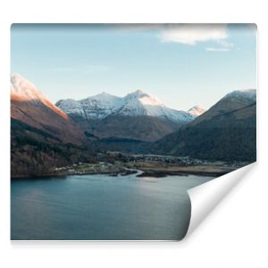 Aerial View of Glencoe and the Mountains Surrounding The Small Town in Scotland