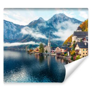 Misty autumn scene of Hallstatt lake. Splendid morning viev of Hallstatt village, in Austria's mountainous Salzkammergut region, Austria. Beauty of countryside concept background.