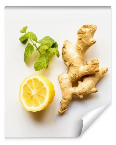 top view of ginger root, lemon and mint on white background