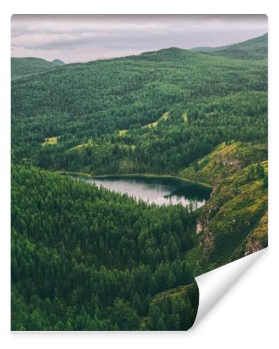 majestic mountains covered with trees and beautiful mountain lake in Altai, Russia