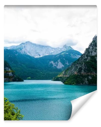 landscape of beautiful Piva Lake, mountains and clouds in Montenegro