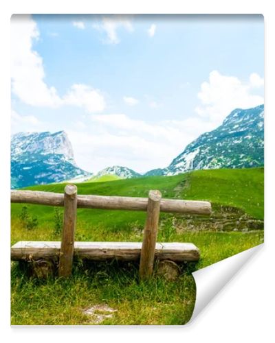 wooden bench with beautiful mountains in Durmitor massif, Montenegro