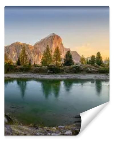 Panorama of the lake Lago di Limedes with the reflection of the surrounding mountains