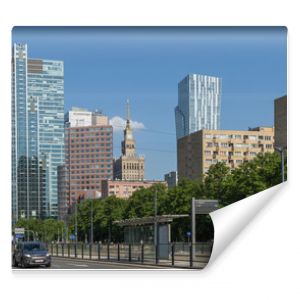 Warsaw cityscape - view of the street and skyscrapers in the center on a sunny day