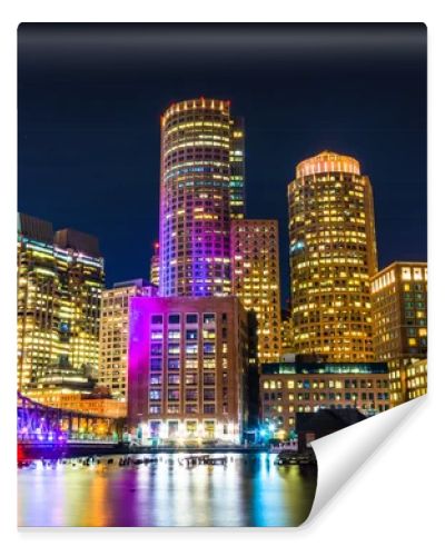 The Boston skyline and Fort Point Channel at night from Fan Pier