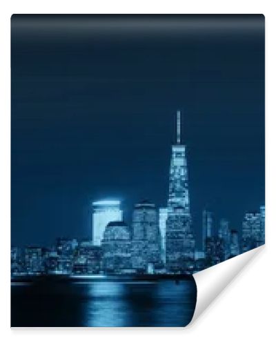 New York City skyline with skyscrapers over Hudson River viewed from New Jersey at night