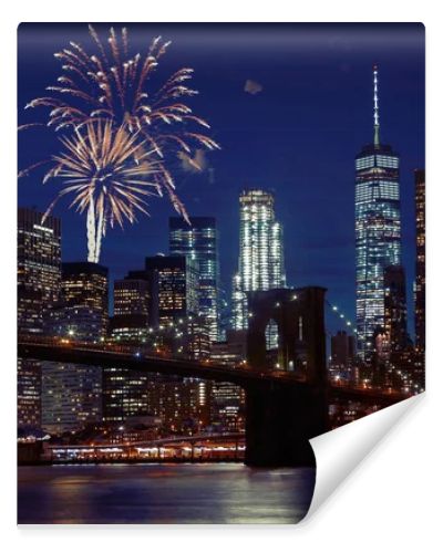 Fireworks over New York City skyline and Brooklyn Bridge