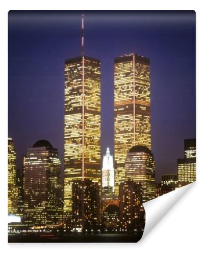 New York City skyline with the World Trade Center towers at night. Horizontal shot.