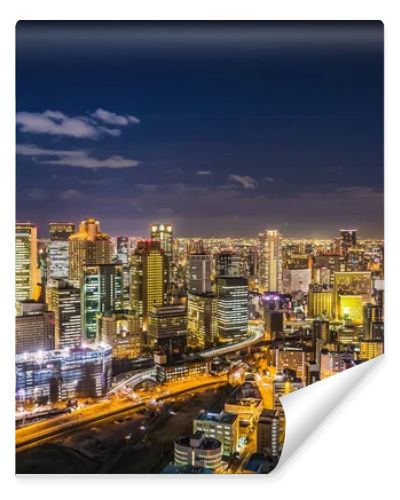Aerial view of the Osaka cityscape at night from the observation platform at the Umeda sky building.