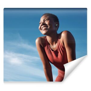 Fitness, black woman and happy athlete smile after running, exercise and marathon training workout. Blue sky, summer sports and run of a African runner breathing with happiness from sport outdoor