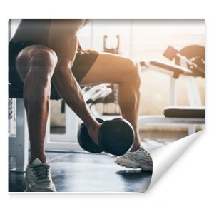 strong athlete man person exercising in the sport gym, workout exercise training in fitness for body strong and fit, bodybuilding and healthy lifestyle people