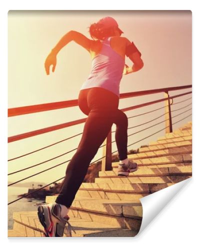 Runner athlete running up stairs
