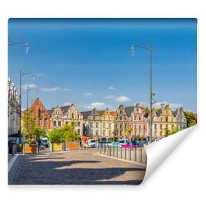Arras cityscape with Flemish-Baroque-style townhouses buildings on La Grand Place square in old town center, blue sky in summer day, Pas-de-Calais department, Hauts-de-France Region, Northern France