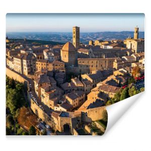 Italy. Volterra - scenic medieval town of Tuscany, Italian famous landmarks and heritage site. aerial drone panorama over sunset.
