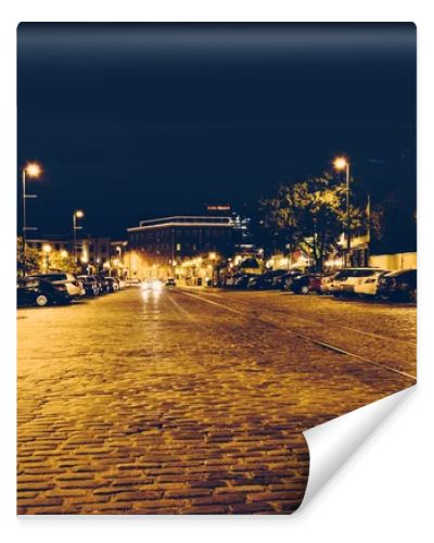 Cobblestone street in Fells Point at night, Baltimore, Maryland.