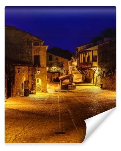 Panoramic view of the stone village with stone houses at dusk. Santander, Santillana del Mar.