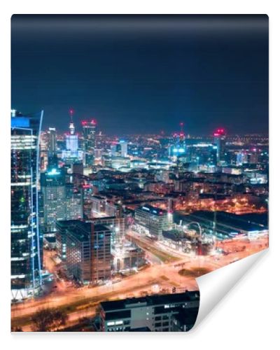 Aerial view of Warsaw business center at night: skyscrapers and 