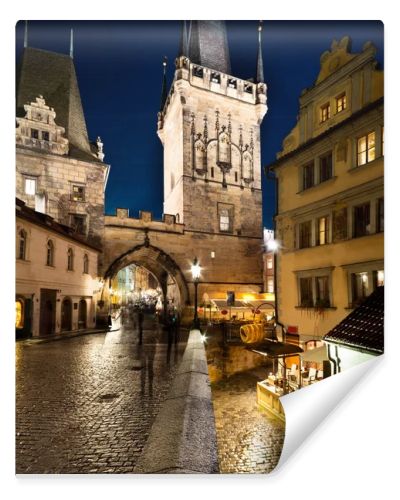 Charles Bridge Tower on a rainy night in Prague