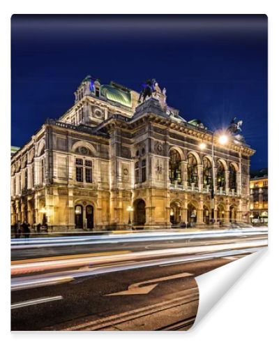 Wien opera building facade at night and traffic trails