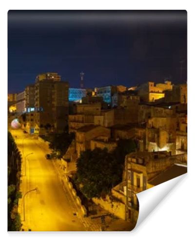 Night old medieval Ragusa famous Sicilian town view (Sicily, Italy). Unesco world heritage site. Some lens flares from nearest city lights enable.