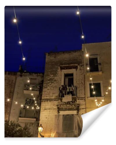  Night view in amazing Old Town , historical center of Bari , Italy. Street Casamassimi .